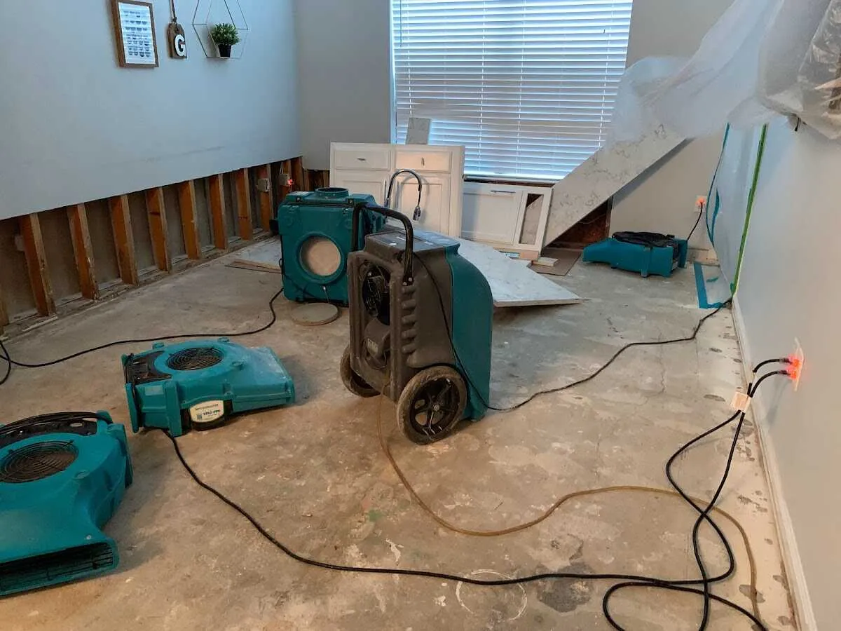 Dehumidifier in flood-cut room for Water Damage Restoration in Colleyville