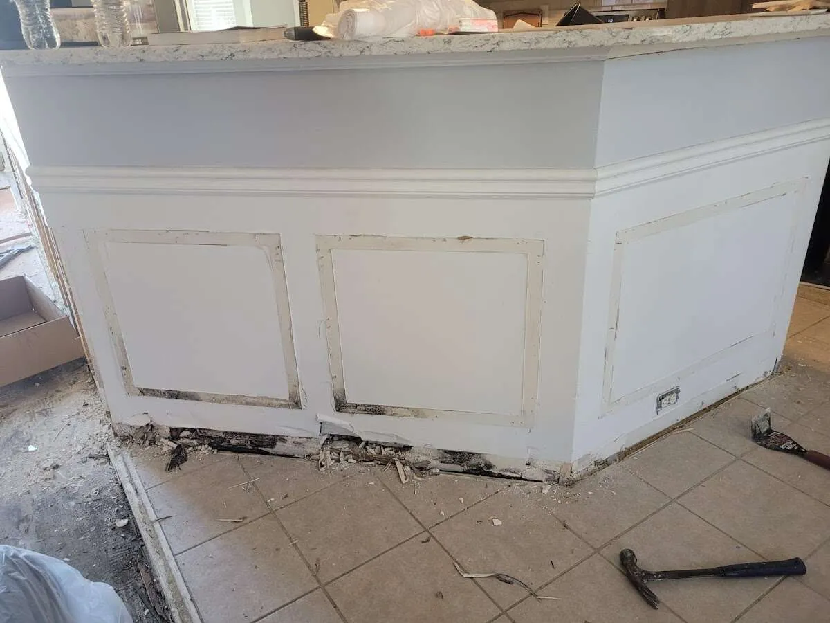 Water damage and mold on kitchen during Storm Damage Restoration in Colleyville